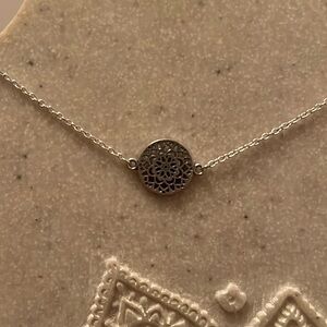 Silver plated necklace with with 16” chain.  New.